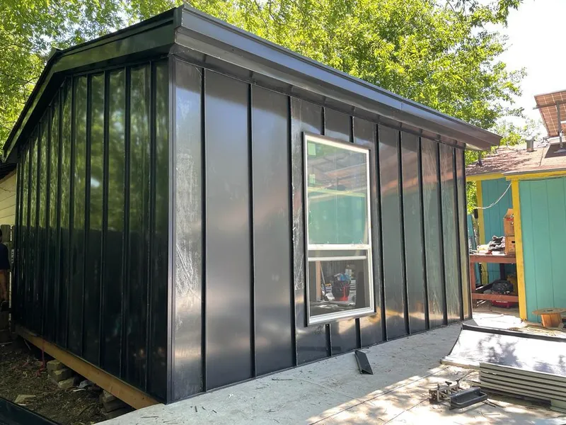 Black standing seam metal wall panels for Roof Inspection in Petaluma