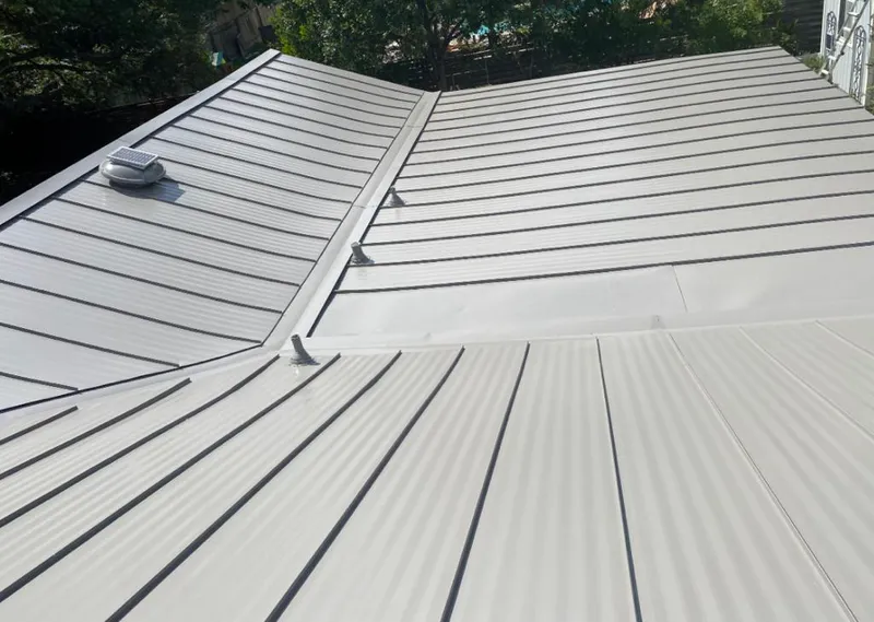 Solar attic fan installed on a metal roof for Roof Ventilation in Petaluma